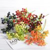 High quality artificial red berry Christmas decorations are used for family wedding decorations